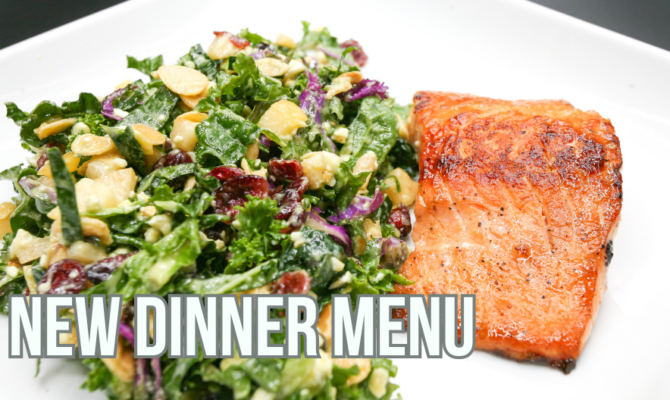Grilled salmon served with kale salad. New dinner menu for Avon, CO dining.