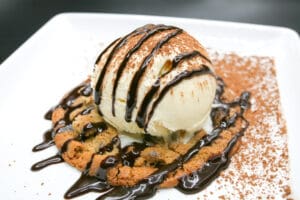 Vanilla ice cream and chocolate chip cookie on the dessert menu.